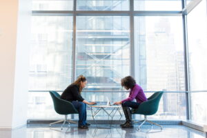2 women working