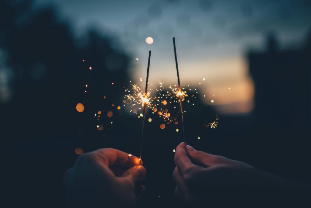 holding sparkler