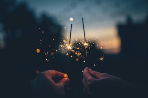 holding sparkler